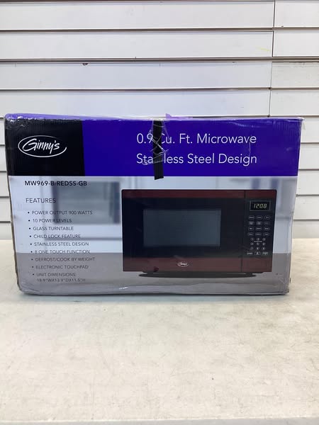 Ginny's .9 Cu. Ft. Metallic Microwave in Red