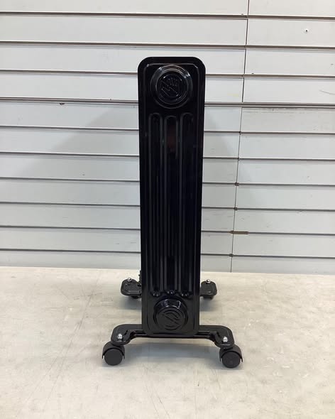Konwin 1500-Watt Black Indoor Electric Oil-Filled Radiator Convection Radiant Space Heater - Lightly used