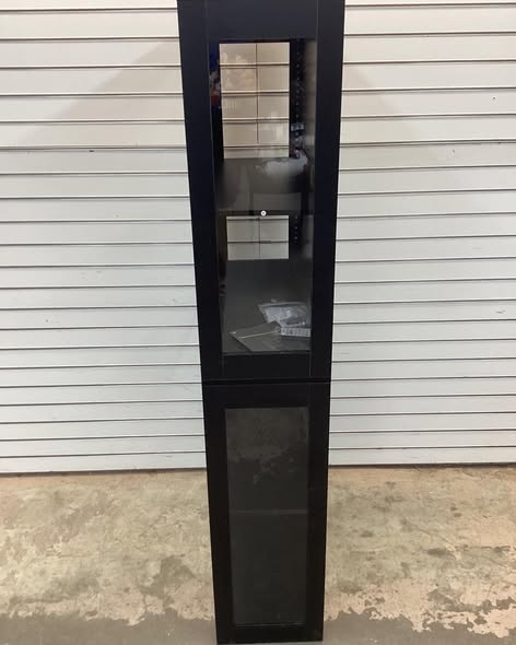 4 shelf glass door curio cabinet.