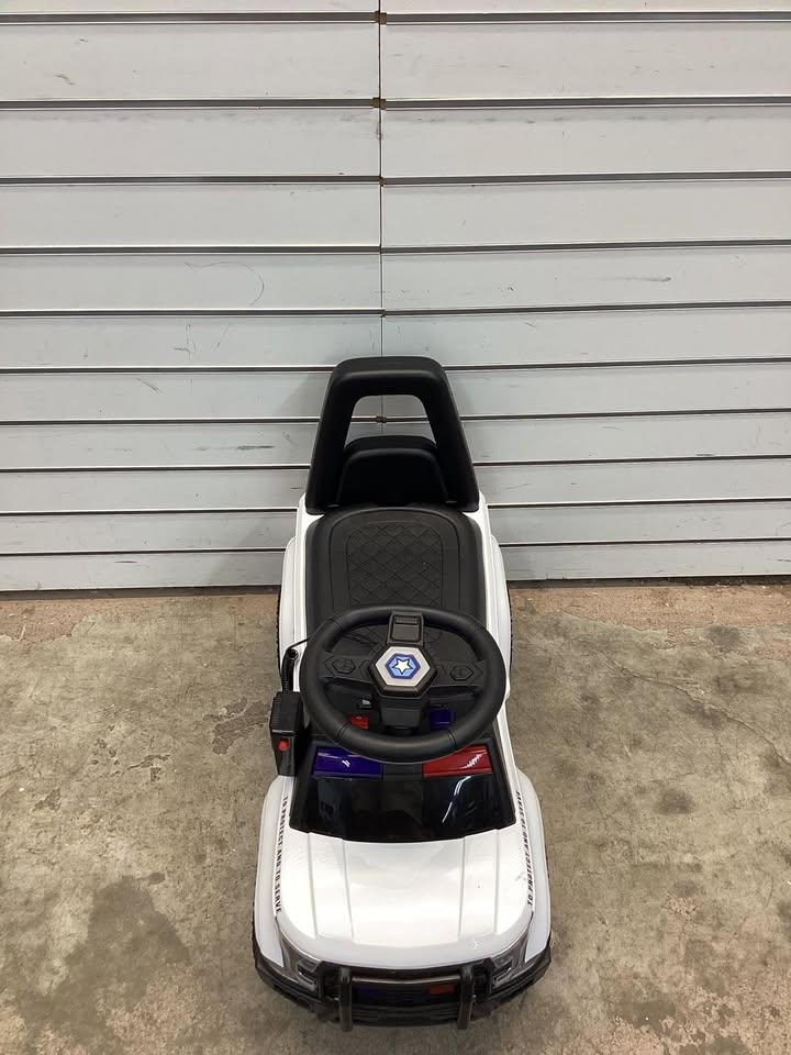 children’s police car with megaphone