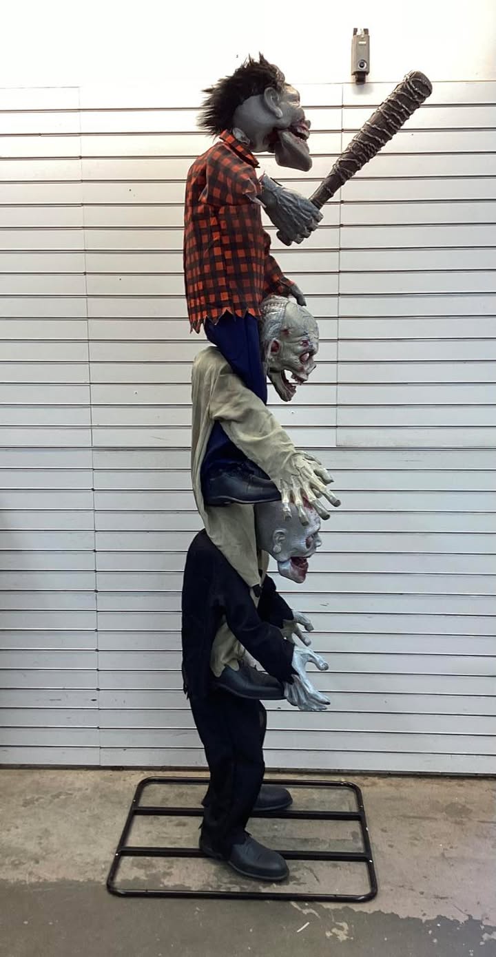 Home Accents Holiday 7.5 ft. Gruesome Grounds Animated LED Zombie Stack Trio