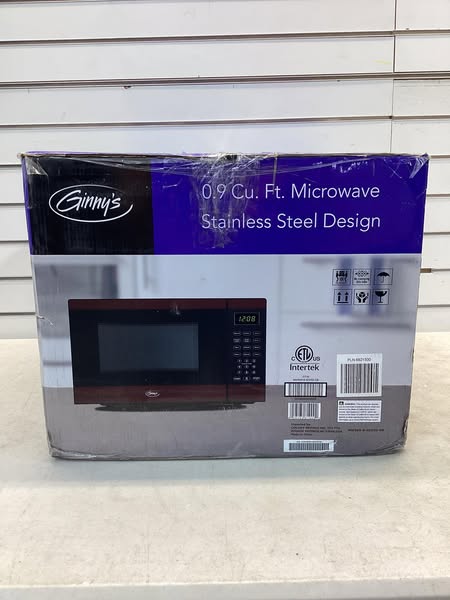 Ginny's .9 Cu. Ft. Metallic Microwave in Red