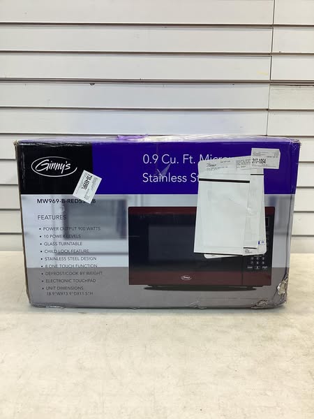 Ginny's .9 Cu. Ft. Metallic Microwave in Red
