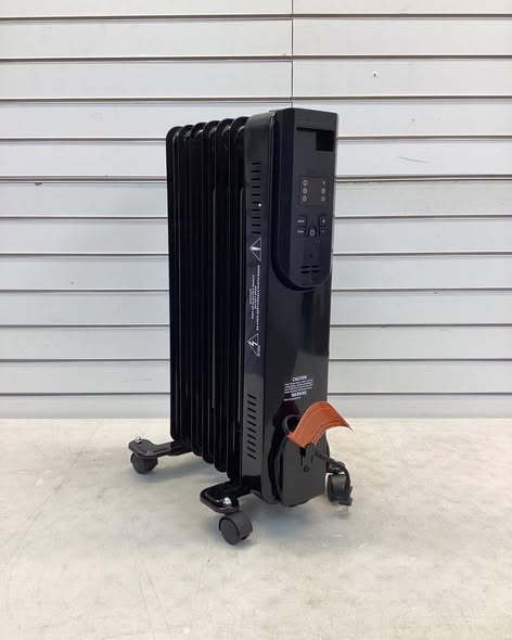 Konwin 1500-Watt Black Indoor Electric Oil-Filled Radiator Convection Radiant Space Heater - Lightly used