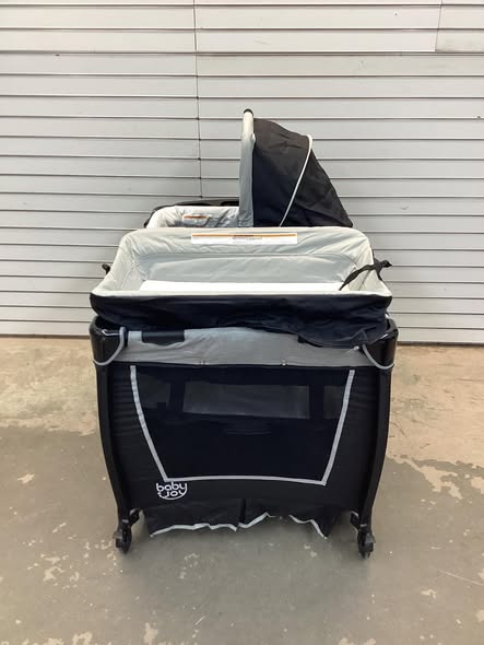 Costway 4-in-1 Convertible Portable Baby Play yard with Toys and Music Player