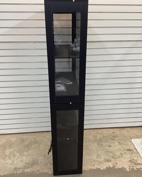 4 shelf glass door curio cabinet.