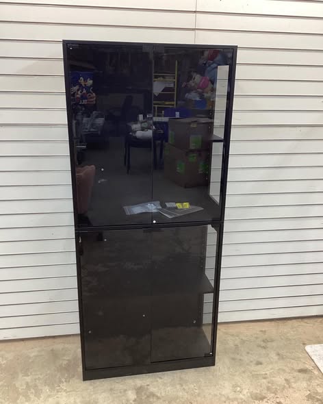 4 shelf glass door curio cabinet.