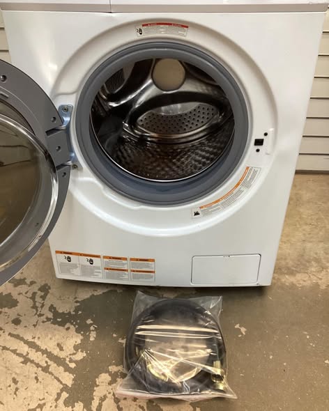 Lightly used Hamilton Beach 2.7 cu. ft. White All-in-One Front Loading Washer and Dryer Combo