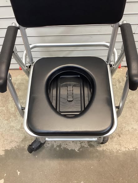 Costway 4-in-1 Foldable Bedside Commode Chair with Brakes and Bucket and Footrest