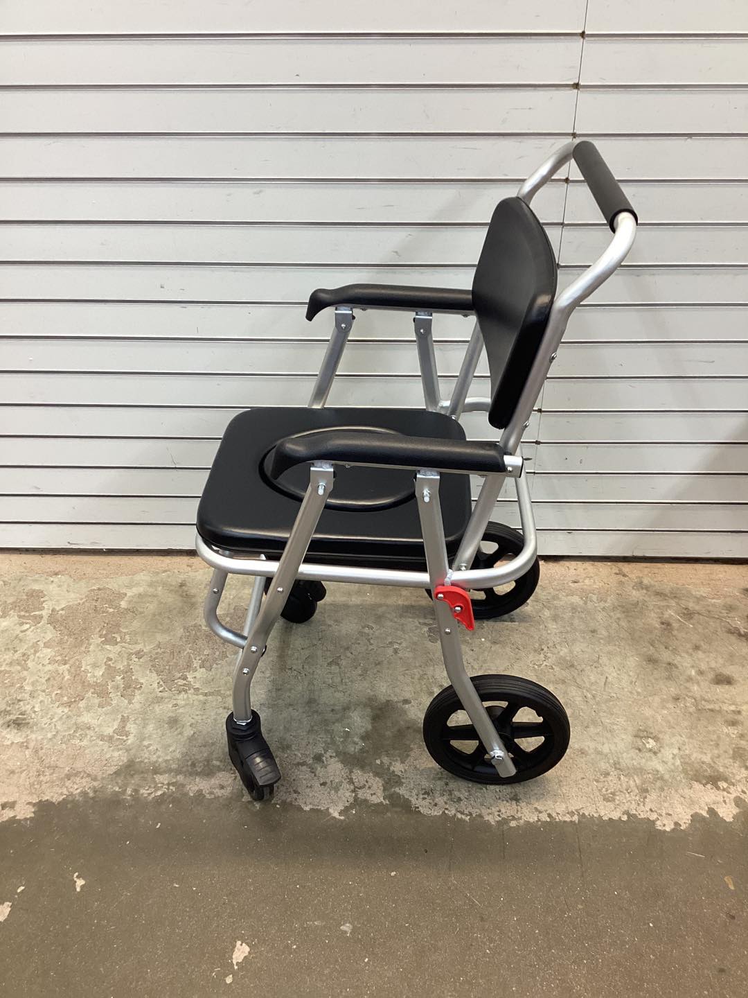 Costway 4-in-1 Foldable Bedside Commode Chair with Brakes and Bucket and Footrest