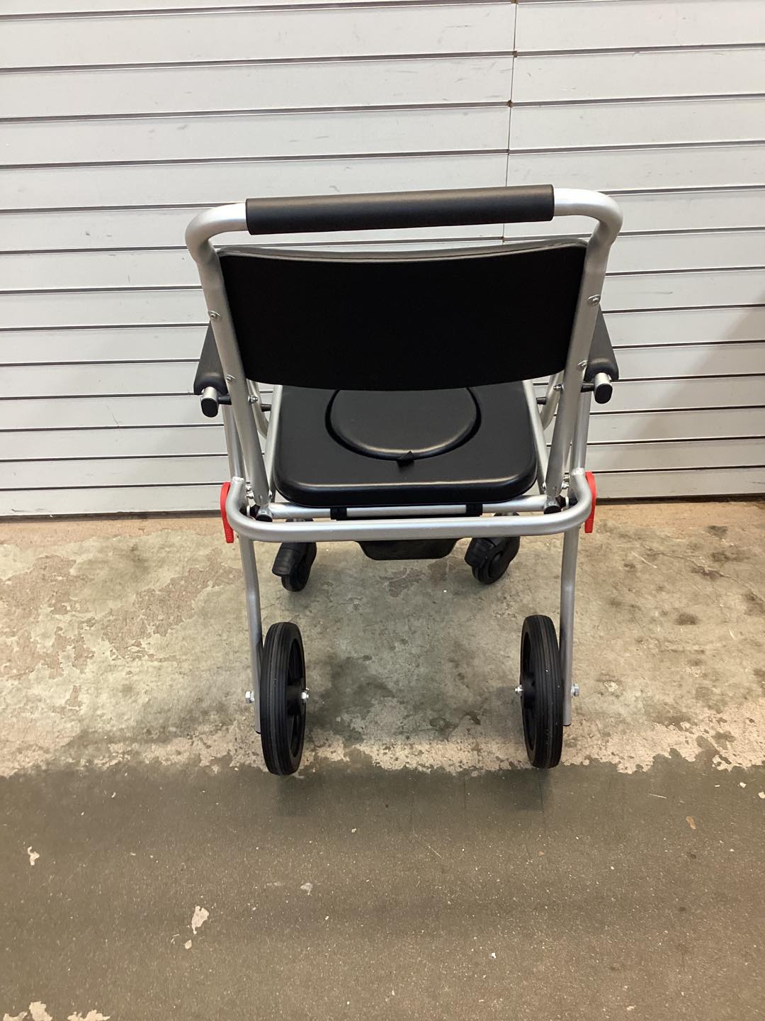 Costway 4-in-1 Foldable Bedside Commode Chair with Brakes and Bucket and Footrest
