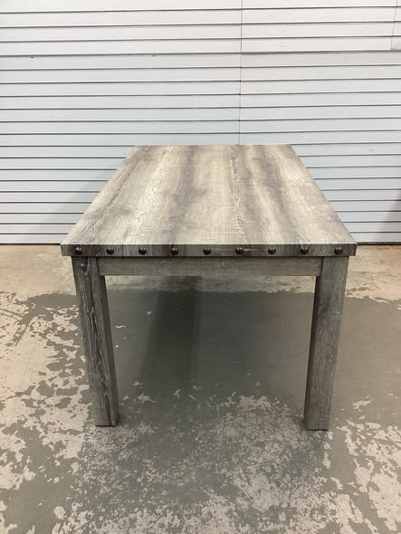 Fort Rustic Wood Dining Table with Rivets and Distressed Texture