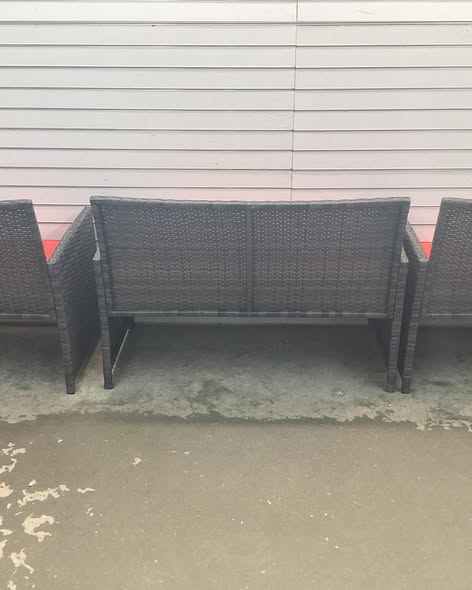 Costway 4 -Piece Rattan Patio Conversation Set with Red Cushions.