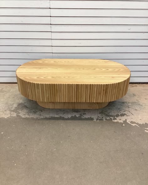 Hermes 43.7'' W Solid Wood Oval Coffee Table with Fluted Design