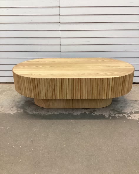 Hermes 43.7'' W Solid Wood Oval Coffee Table with Fluted Design