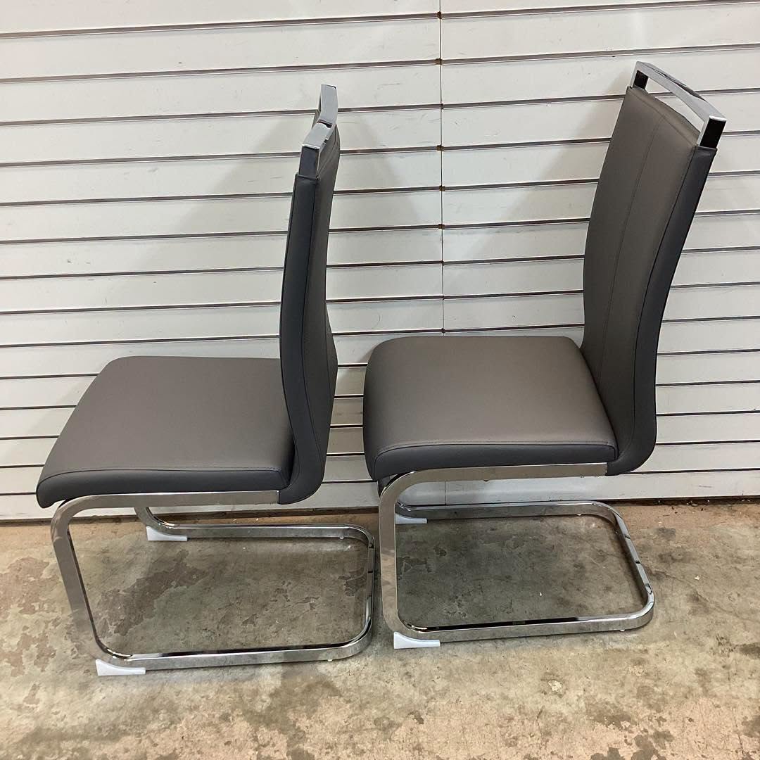 Modern Faux Leather Cantilever Dining Chairs with Chrome Base and Metal Handles (Set of 2)