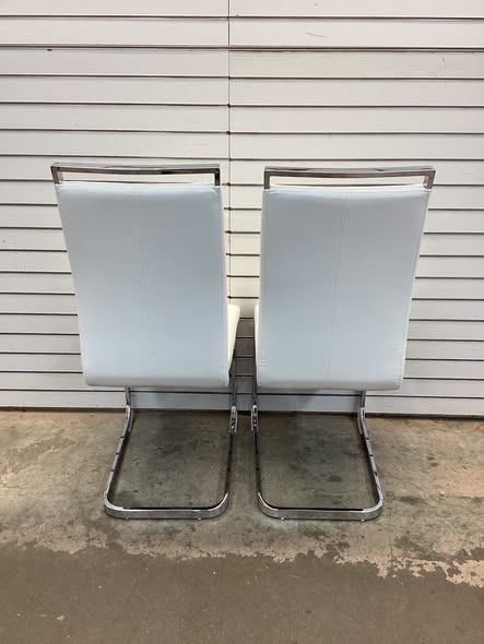 Modern Faux Leather Cantilever Dining Chairs with Chrome Base and Metal Handles (Set of 2)