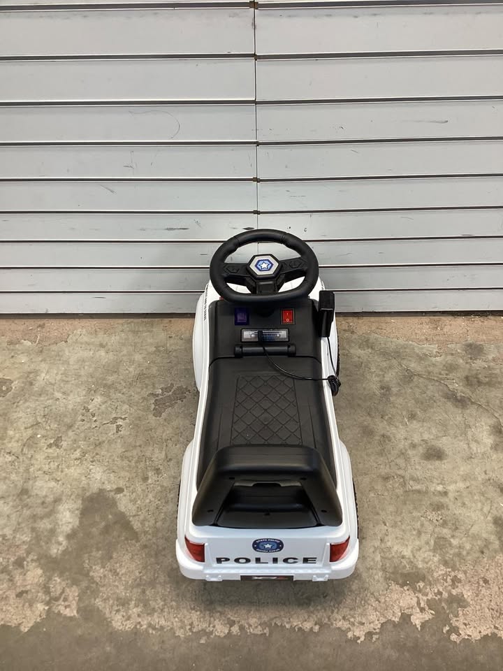 children’s police car with megaphone