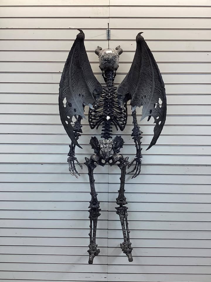 5-foot Home Accents Holiday Ultra Poseable LED Skeleton Demon with Light Up Eyes