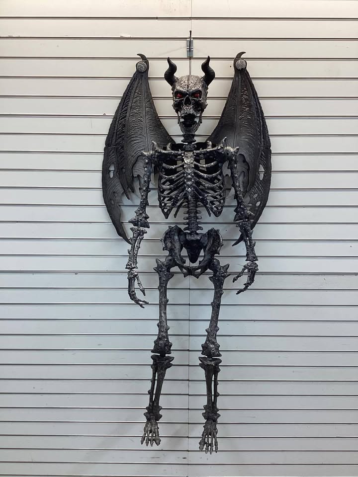 5-foot Home Accents Holiday Ultra Poseable LED Skeleton Demon with Light Up Eyes