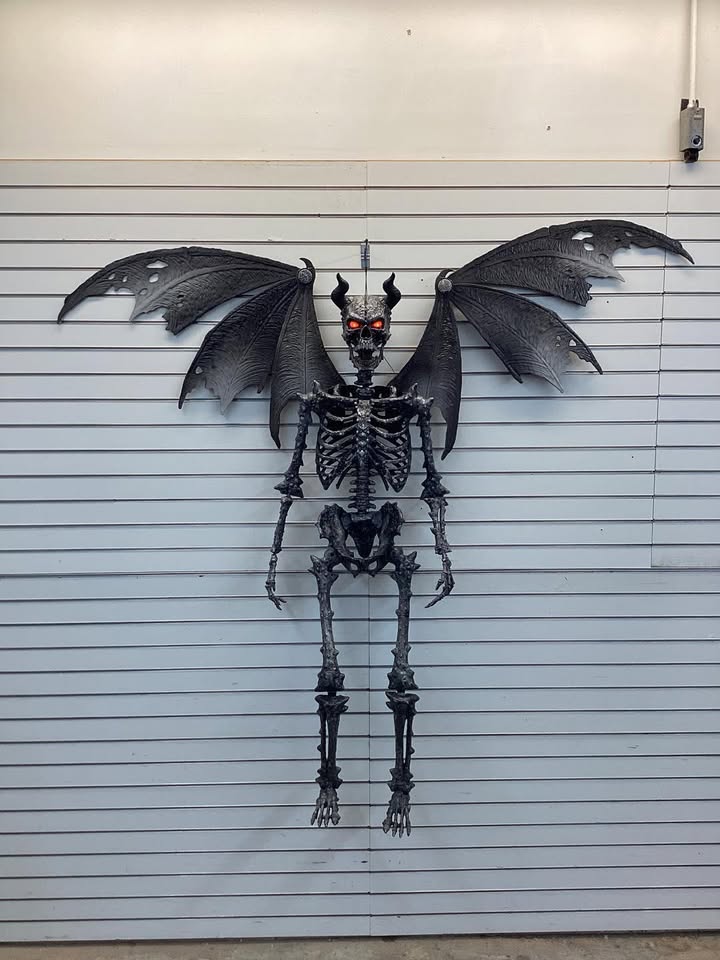 5-foot Home Accents Holiday Ultra Poseable LED Skeleton Demon with Light Up Eyes