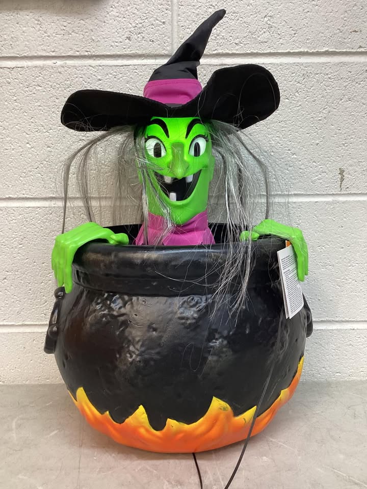Animated Spooky Witch Coming Out of Cauldron animatronic novelty piece from the Hyde & EEK! Boutique line