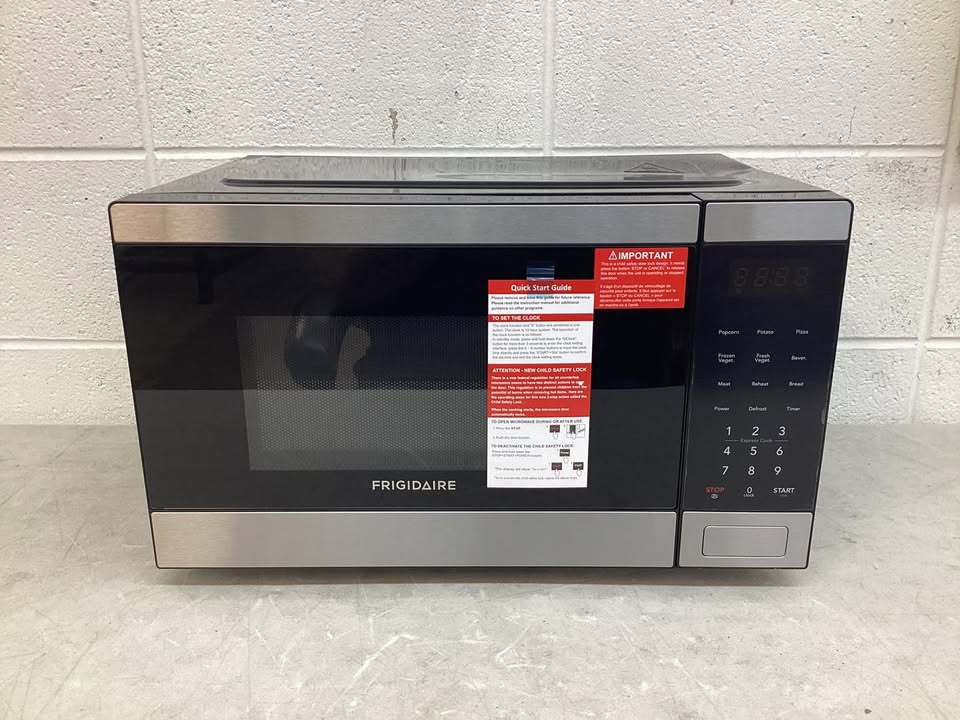 Frigidaire 0.9-cu ft 900 -Watt Countertop Microwave ( Stainless )