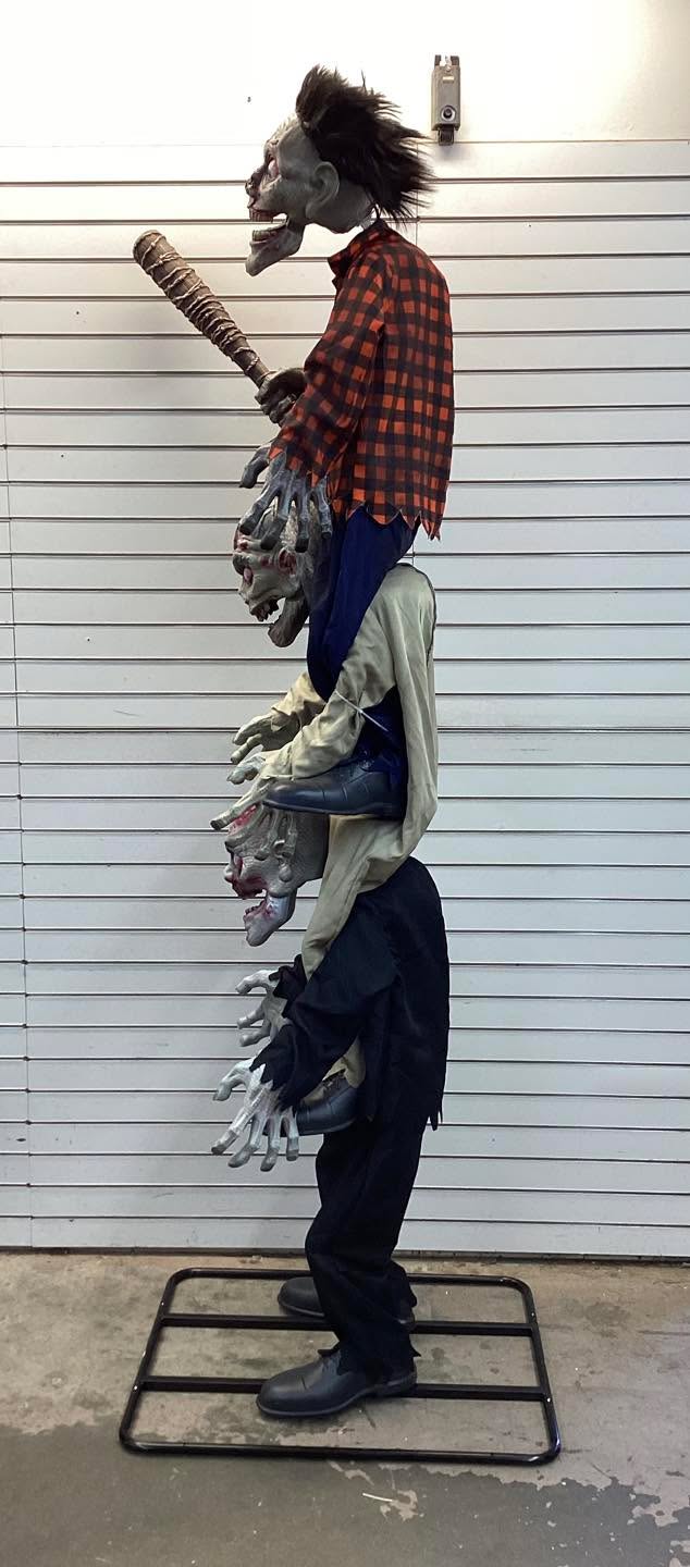 Home Accents Holiday 7.5 ft. Gruesome Grounds Animated LED Zombie Stack Trio