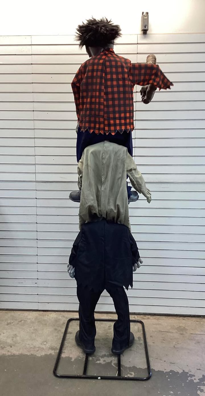 Home Accents Holiday 7.5 ft. Gruesome Grounds Animated LED Zombie Stack Trio