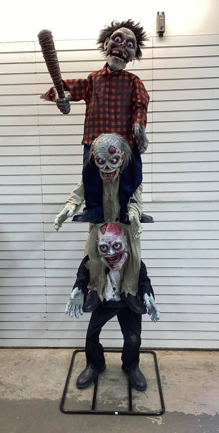 Home Accents Holiday 7.5 ft. Gruesome Grounds Animated LED Zombie Stack Trio