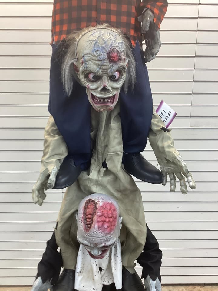Home Accents Holiday 7.5 ft. Gruesome Grounds Animated LED Zombie Stack Trio