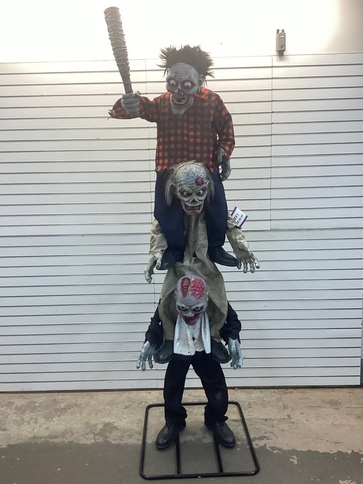 Home Accents Holiday 7.5 ft. Gruesome Grounds Animated LED Zombie Stack Trio