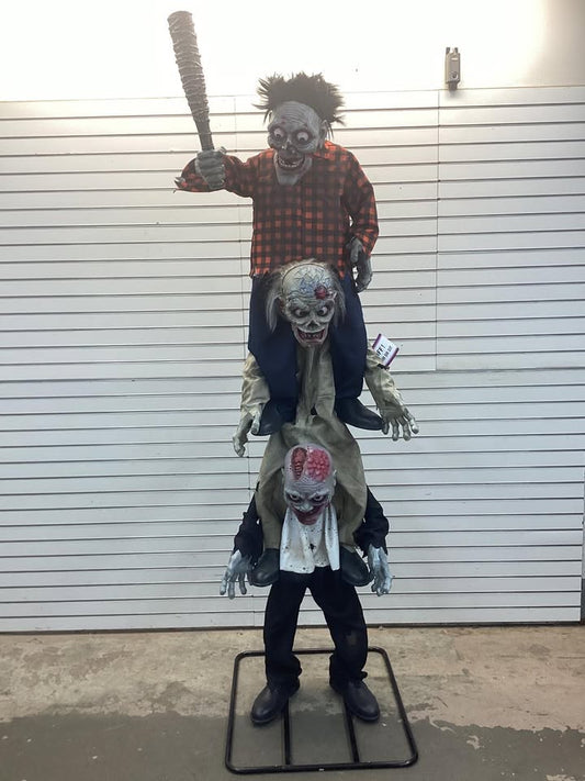Home Accents Holiday 7.5 ft. Gruesome Grounds Animated LED Zombie Stack Trio
