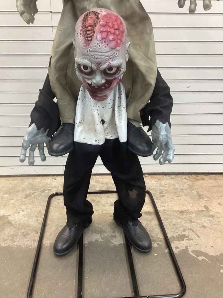 Home Accents Holiday 7.5 ft. Gruesome Grounds Animated LED Zombie Stack Trio