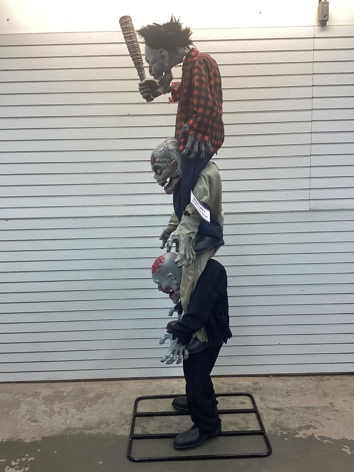 Home Accents Holiday 7.5 ft. Gruesome Grounds Animated LED Zombie Stack Trio